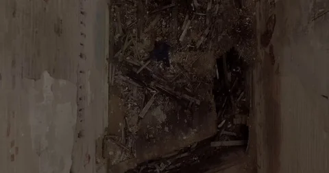 Foot Chase in Abandoned Building Stock Footage 79832335