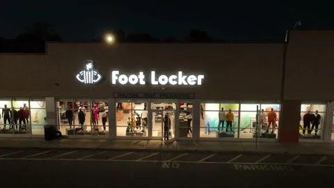 Foot Locker shoe Aerial at night Stock Video Pond5