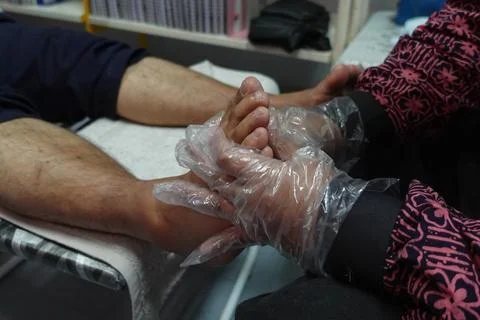 A foot massage Stock Photos