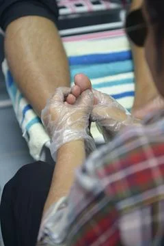 A foot massage Stock Photos