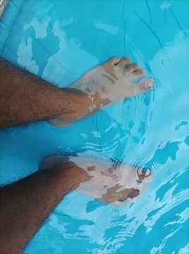 Foot on plastics pool 写真素材