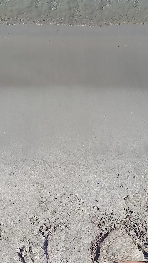 Foot playing with the sand Stock Footage 255444909