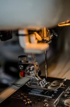 Foot Sewing Machine With Thread Inserted On The Needle Stock Photos