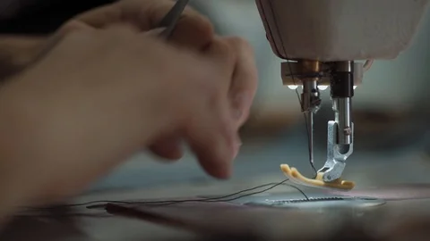 Foot sewing machinet Stock Footage 99815384