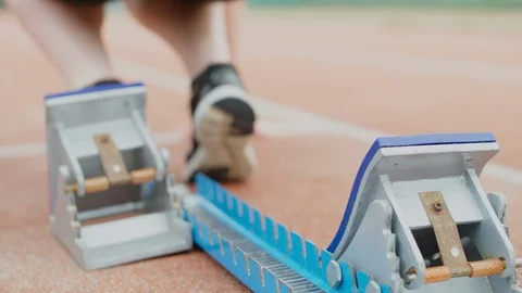 A foot on the starting block Stock Footage 94253390