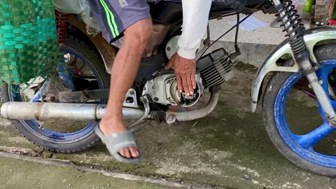 Foot Starting a Motorcycle Engine Stock Footage 325255499