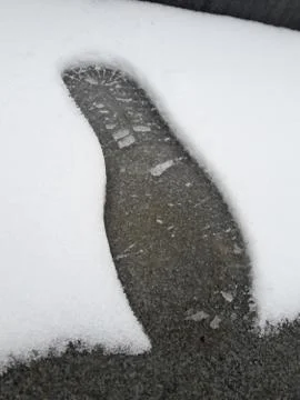 Foot step on the snow Stock Photos
