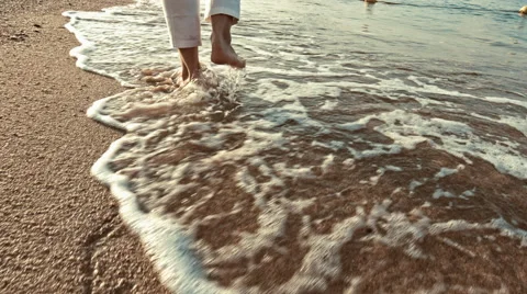 Foot steps on the beach Stock Footage 52366244