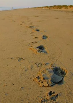 Foot steps on the beach Foto stock