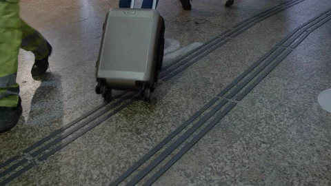 Foot view of people walking in a train station Video stock 187093282