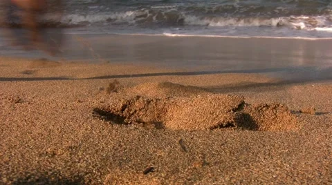 Foot walking in sand Stock Footage 2309241