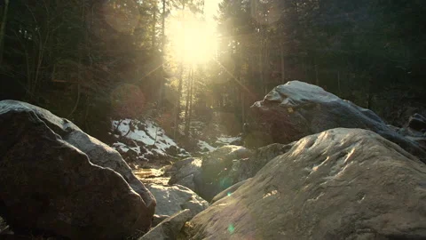 Foot of waterfall in mountains at sunset Stock Footage 131646529
