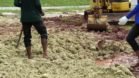 Footage 4K: Labor man digging in the sand Stock Footage 161257244