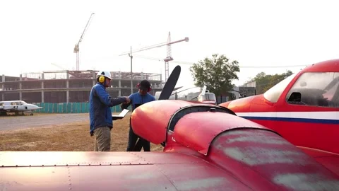Footage 4K: Male engineer using digital tablet with a small plane Stock-Footage 147143348