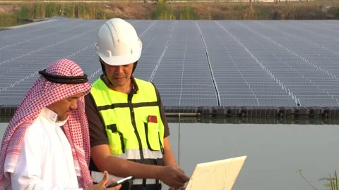 Footage 4K: Middle Eastern Arabs inspecting solar farms with engineers Stock Footage 232487394