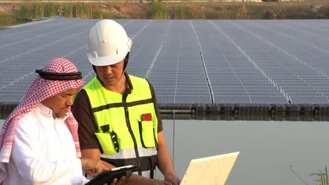Footage 4K: Middle Eastern Arabs inspecting solar farms with engineers Stock Footage 232487424