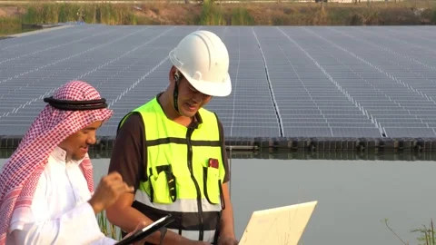 Footage 4K: Middle Eastern Arabs inspecting solar farms with engineers Stock Footage 232487859