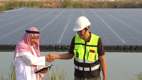 Footage 4K: Middle Eastern Arabs inspecting solar farms with engineers Stock Footage 232488108