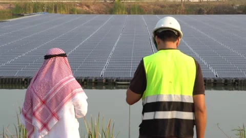 Footage 4K: Middle Eastern Arabs inspecting solar farms with engineers Stock Footage 232488118