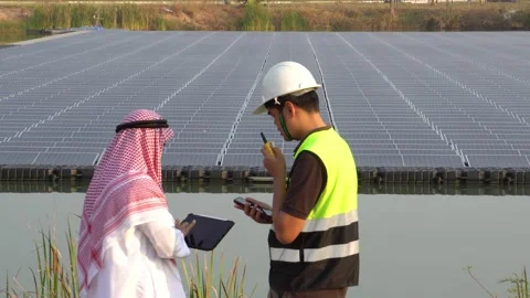Footage 4K: Middle Eastern Arabs inspecting solar farms with engineers Stock Footage 232488302