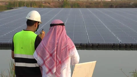 Footage 4K: Middle Eastern Arabs inspecting solar farms with engineers Stock Footage 232489188