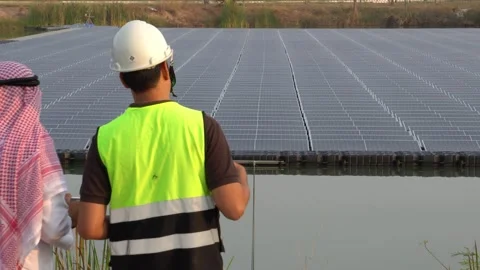 Footage 4K: Middle Eastern Arabs inspecting solar farms with engineers Stock Footage 232489363