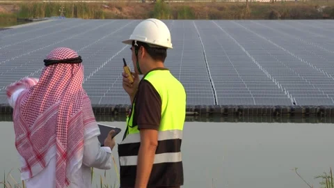 Footage 4K: Middle Eastern Arabs inspecting solar farms with engineers Stock Footage 232489366