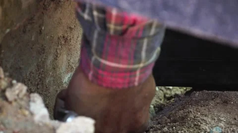 Footage 4K: A technician's hand is working on concrete and steel construction Stock Footage 138752314