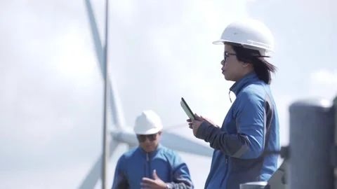 Footage 4K: Two engineers are talking about wind turbine system Stock Footage 133124828