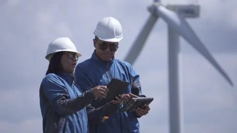 Footage 4K: Two engineers are talking about wind turbine system Stock Footage 133124920