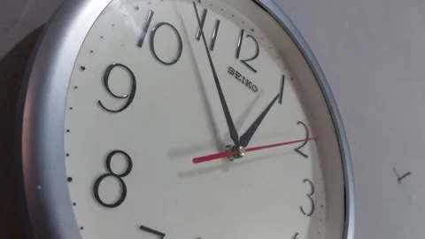 Footage of an analog quartz wall clock made in Japan Stock Footage 326195128