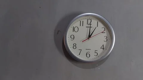 Footage of an analog quartz wall clock made in Japan Stock Footage 326195517