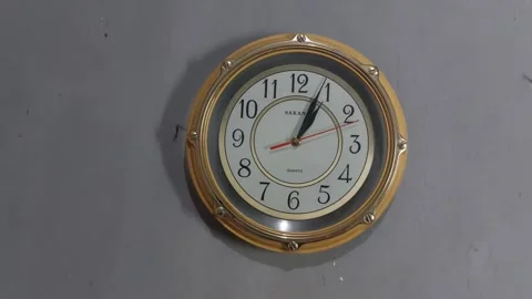 Footage of an analog quartz wall clock made in Japan Stock Footage 326195528