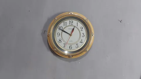 Footage of an analog quartz wall clock made in Japan Stock Footage 326195540