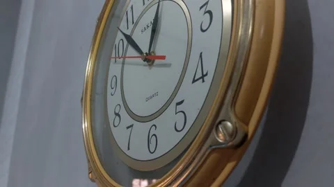 Footage of an analog quartz wall clock made in Japan Stock Footage 326195669