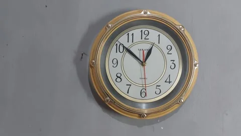Footage of an analog quartz wall clock made in Japan Stock Footage 326195670