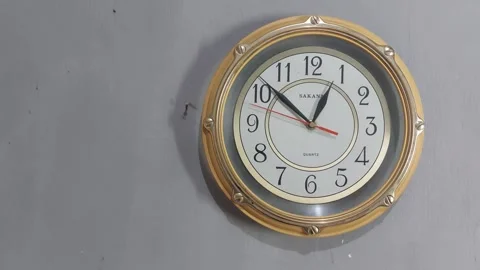Footage of an analog quartz wall clock made in Japan Stock Footage 326195694