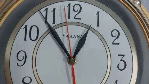 Footage of an analog quartz wall clock made in Japan Stock Footage 326195792