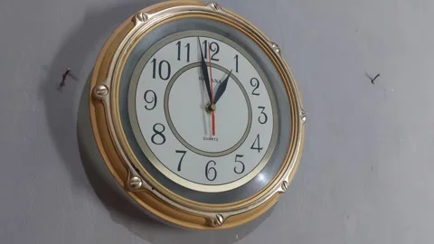 Footage of an analog quartz wall clock made in Japan Stock Footage 326196063