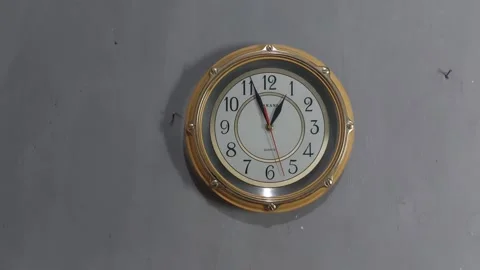 Footage of an analog quartz wall clock made in Japan Stock Footage 326196084