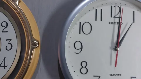 Footage of an analog quartz wall clock made in Japan Stock Footage 326196640