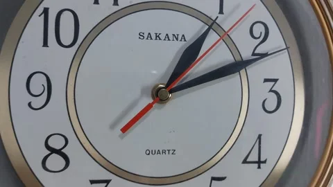 Footage of an analog quartz wall clock made in Japan Stockbeeldmateriaal 326197529