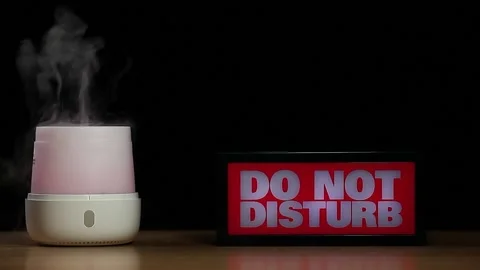 Footage of aroma diffuser do not disturb text dark background Stock Footage 219819626