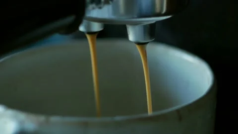 Footage B Roll of Pouring coffee stream from machine in cup. Home making hot Esp Stock Footage 161843653