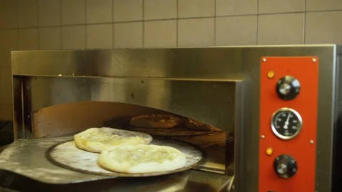Footage of baking a pizza. Video stock 104859500