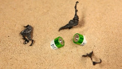 Footage of battery garbage sand background Stock Footage 201467739