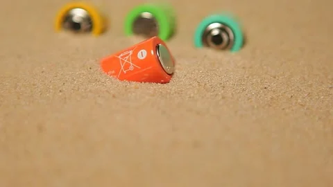 Footage of battery sand background Stock Footage 200426659