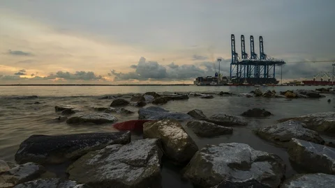 Footage of big cranes lifting export and import cargo at westport, Port Klang Stock Footage 106102404