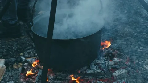 camping - kettle over campfire, Stock Video