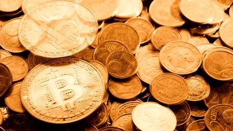 A footage of bitcoins in the reflection of the flame Stock Footage 149034330